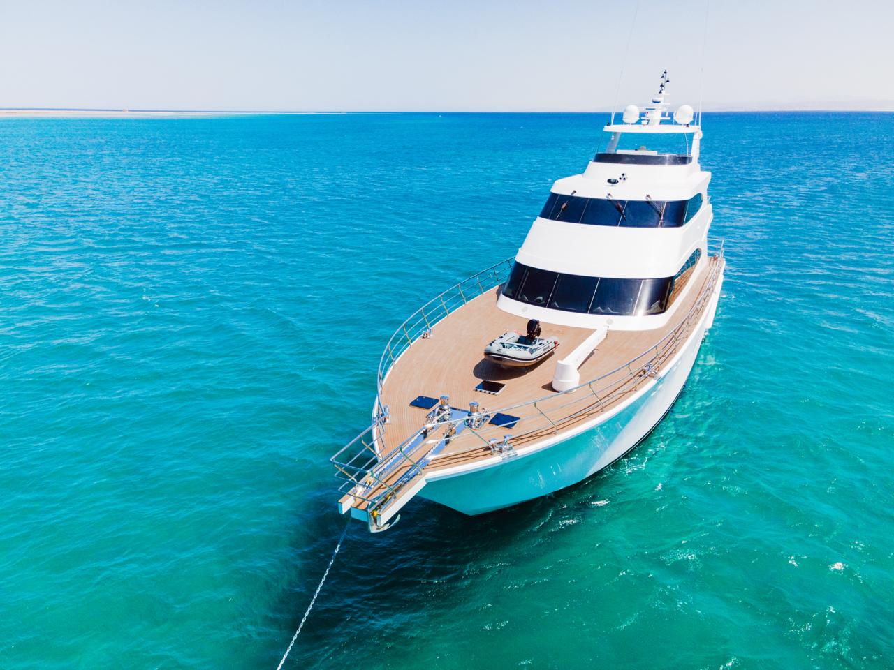 Sport Fisher — Bow view, at anchor