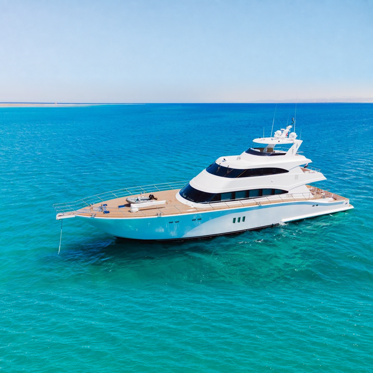 Sport Fisher — Starboard profile, at anchor