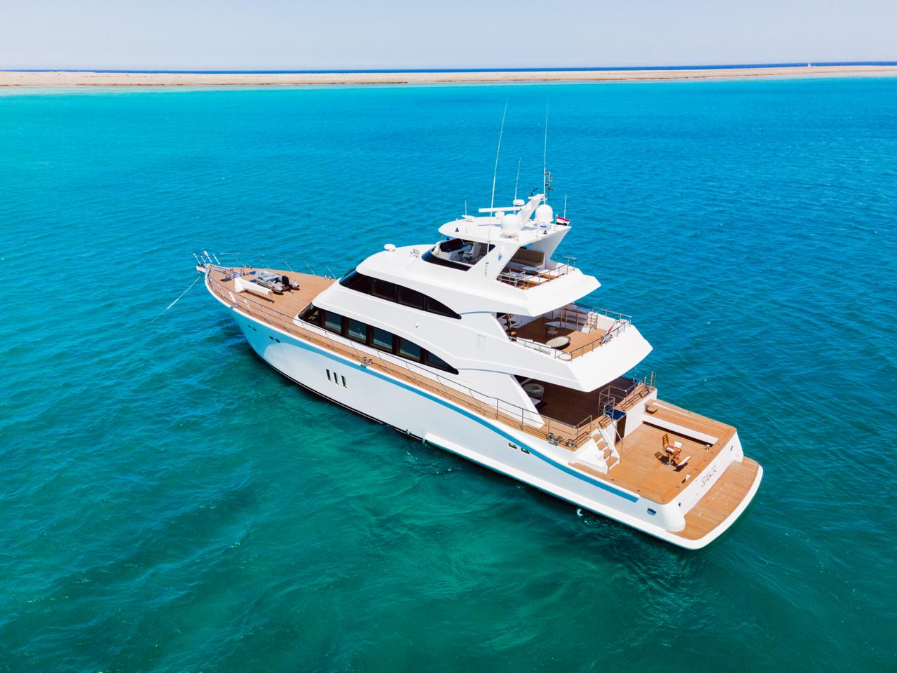 Sport Fisher — Aft quarter, at anchor